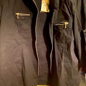 Desire stretch jacketl lots of zipper up pockets